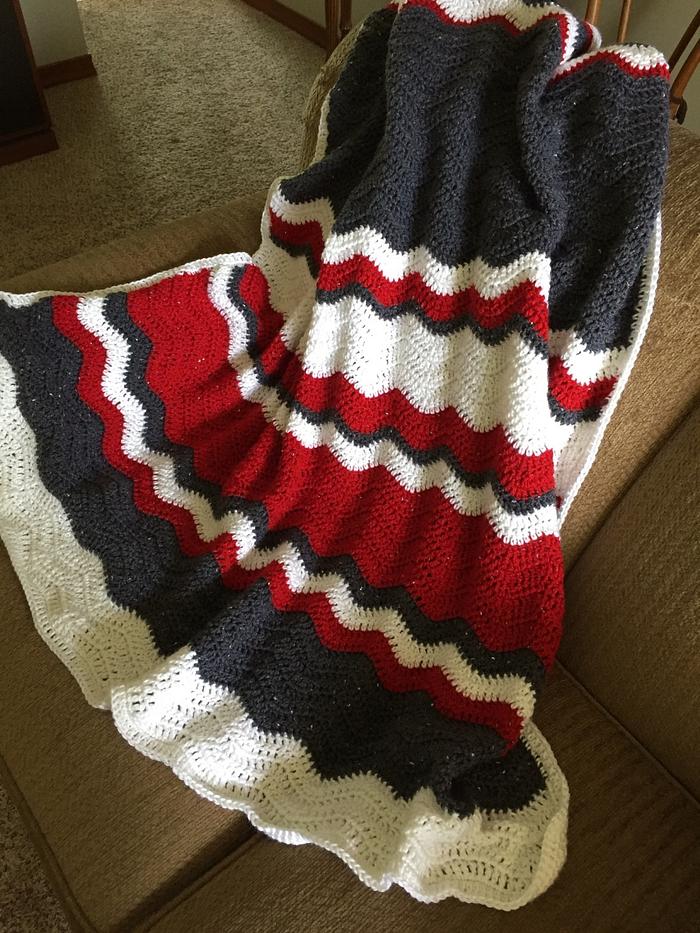 Crocheted OSU baby ripple blanket