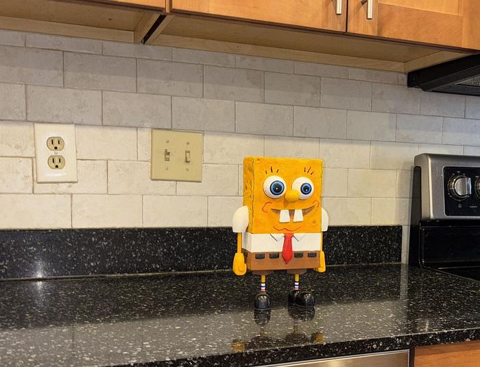 Who lives in a pineapple under the sea?