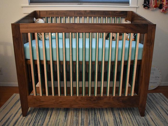 Crib made from walnut and maple