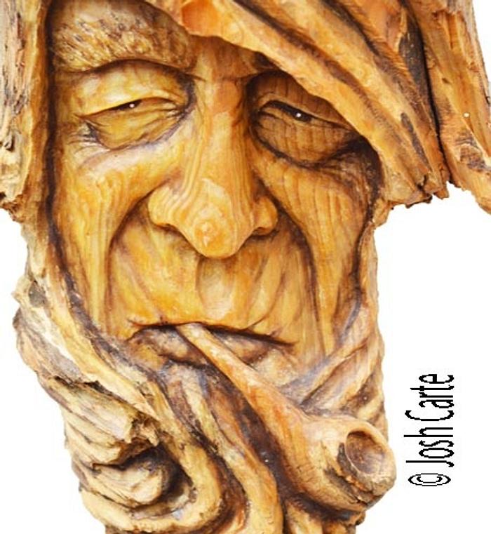 Pipe Smoking Hemlock Face Carving