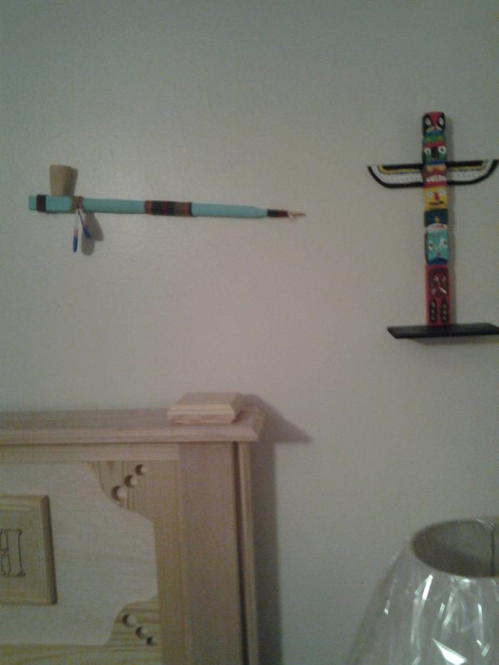peace pipe and totem pole