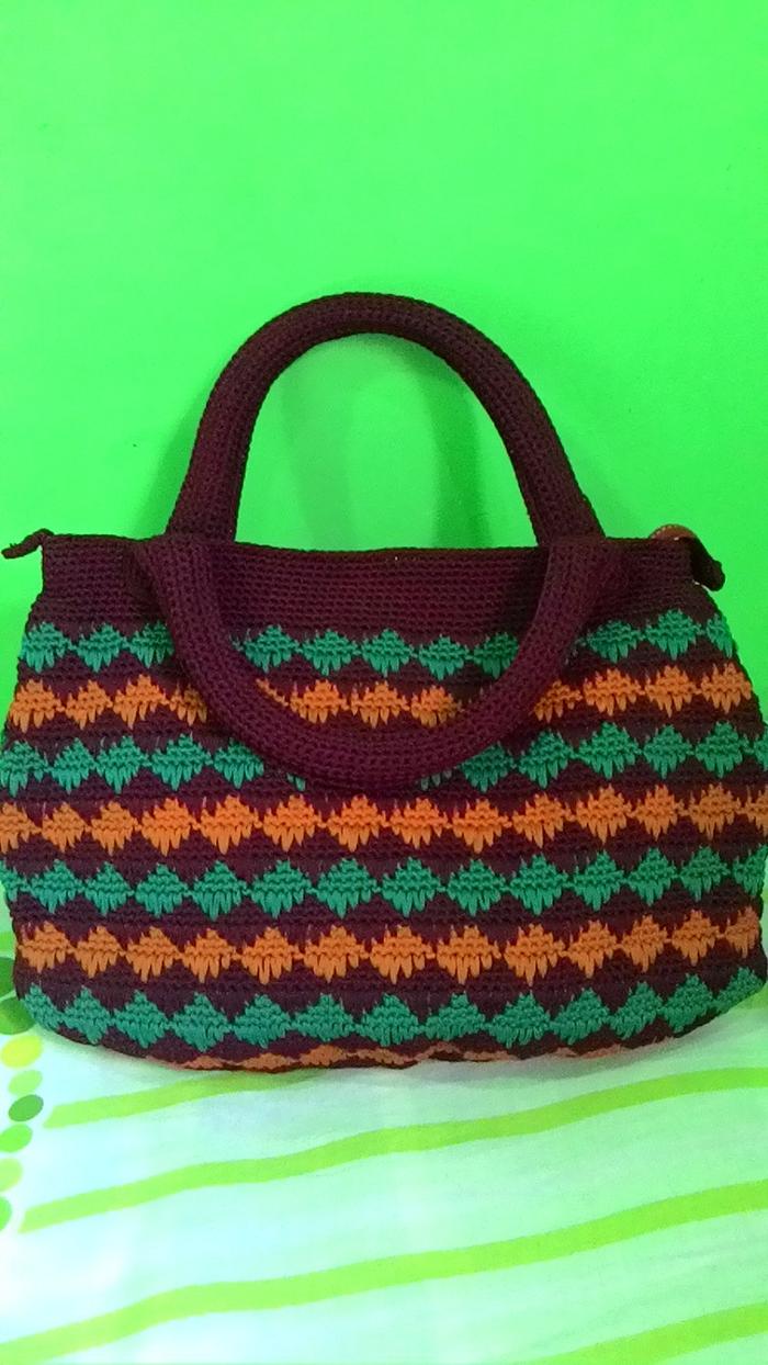 Spike stitch handbag