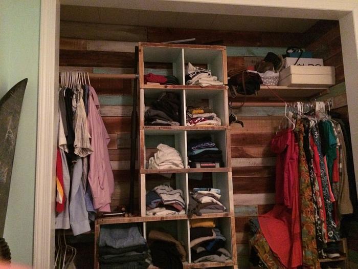 Closet lined with pallet wood